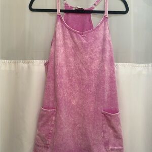 Pink distressed romper with Pockets